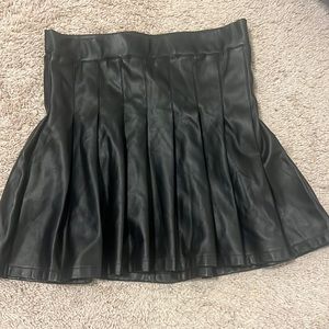I am selling a black leather skirt in the size large